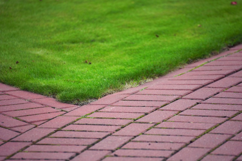 Elevate Your Outdoor Aesthetics: Concrete Landscape Edging in Deerfield, WI.